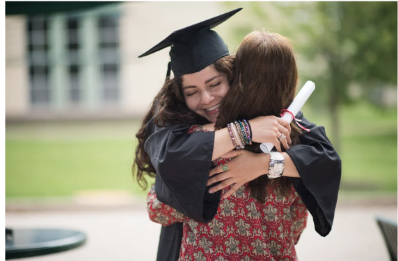 A young adult celebrating graduation